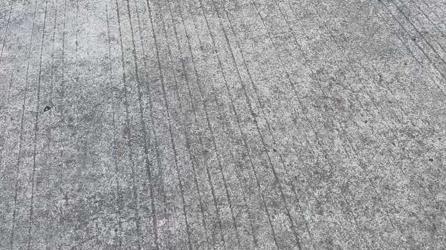 Close up of rough asphalt road surface texture