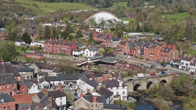 LLANGOLLEN, DENBIGHSHIRE, WALES - APRIL 07, 2026: Aerial view of the stone bridge crossing the River Dee in Llangollen