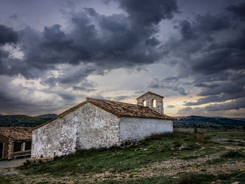 Church of Pradas at sunset on a cloudy day (Valencia-Spain)