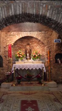 House of Virgin Mary Ephesus Turkey vertical travel video of sacred pilgrimage site - High quality vertical video showing the House of Virgin Mary in Ephesus near Selcuk Turkey. A peaceful and sacred 