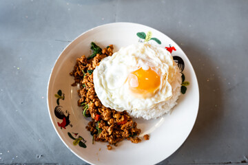 Phat kaphrao, also spelled Pad Kaphrao, in Bangkok street restaurant. It is one of the most popular Thai dishes in Thailand and considered national dish of Thailand