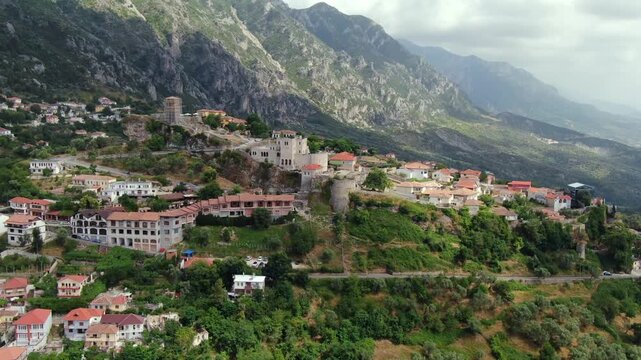 Aerial view of the historic town of Kruje, Albania. The camera is flying over the famous castle with its ancient walls and towers