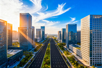 Fototapeta premium Urban Skyscrapers with Wide Avenue at Sunset