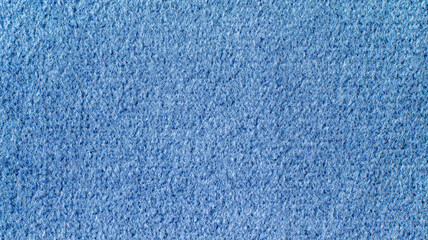 High-quality texture of soft blue velour fabric with a fine fleecy surface. This elegant textile background is perfect for interior design mockups, fashion backdrops, and upholstery visualization. © Александр Серебрянни