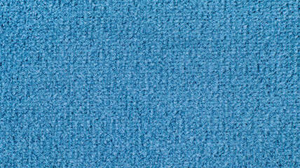 High-quality texture of soft blue velour fabric with a fine fleecy surface. This elegant textile background is perfect for interior design mockups, fashion backdrops, and upholstery visualization. © Александр Серебрянни
