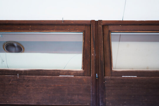 Close-up of vintage wooden transom windows in Japan