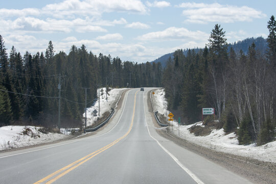 Canada, 11 April 2026 : ZEC Borgia entrance sign on a winding road through a snowy forest landscape
