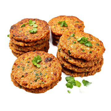 Veggie patties fritters burgers stacked on a transparent background with fresh parsley garnishes for a healthy vegetarian meal