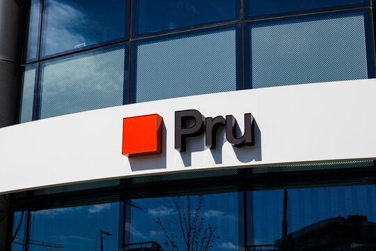Warsaw, Poland &ndash; April 18, 2026: Close-up of Pru logo on modern office building facade with glass panels