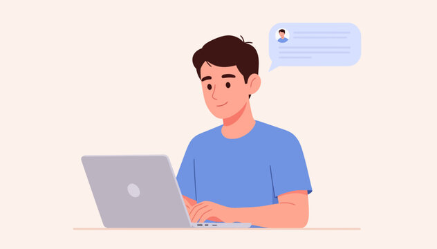 Young man focused on laptop screen