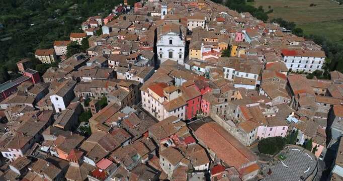 Cinematic aerial perspective Orte Italy city landmarks medieval church central square mountains horizon summer travel tourism destination Lazio scenic panorama
