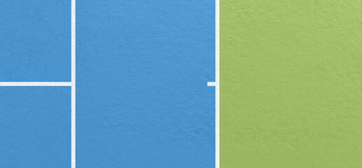 Fototapeta premium Side view of tennis court with blue and green surface divided by white boundary lines