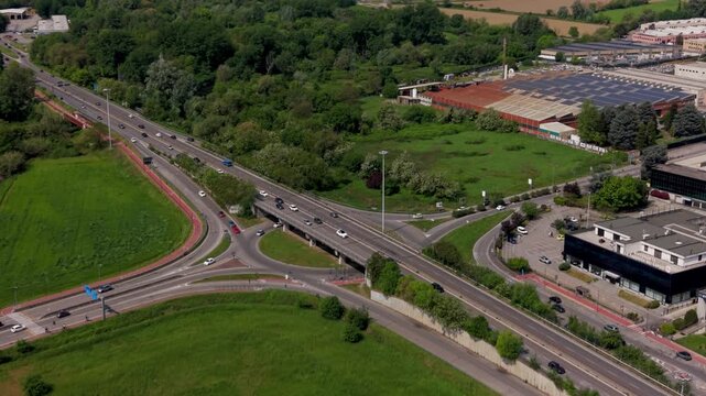 Road and Vegetation Junction: An aerial shot captures an intricate junction, where roads converge amidst patches of vegetation.