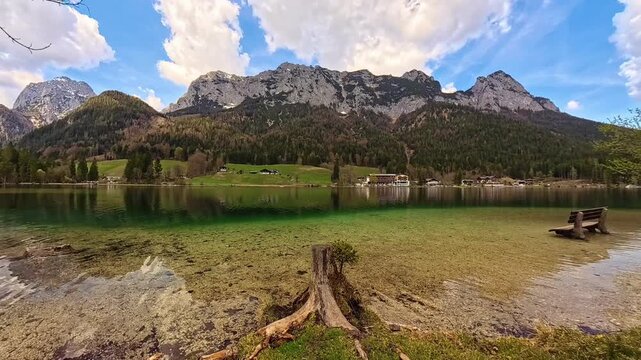 4K Timelapse alpine summer video with moving clouds, waves, reflections and Mount Reiter Alpe at Lake Hintersee, Ramsau bei Berchtesgaden, Berchtesgaden, Bavaria, Germany