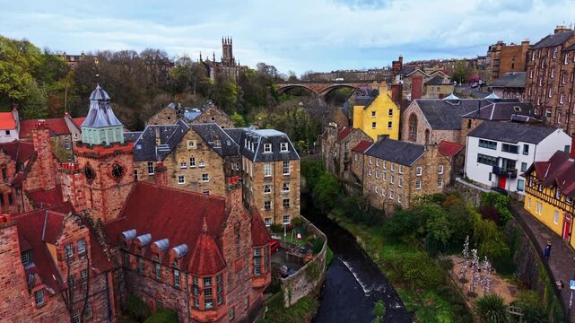 Cinematic drone flyover of Dean Village and the Water of Leith in Edinburgh.