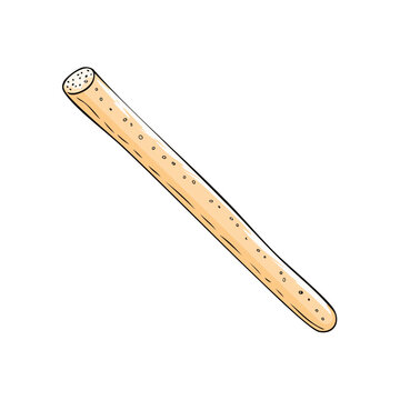 Natural Miswak twig for oral hygiene with a textured surface and small holes
