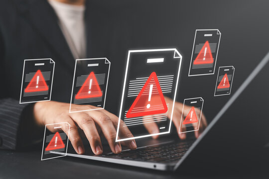 Data breach concept with hacker accessing confidential files, representing insider threats, unauthorized access, information leaks, and cybersecurity risks with warning icons.