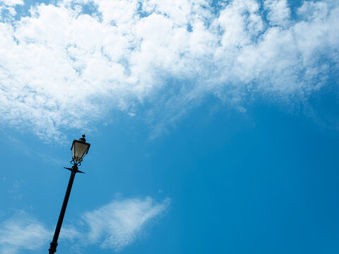 Old streetlights against a sky background