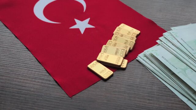 Gold Bullion Bar on Turkish National Flag Close-up