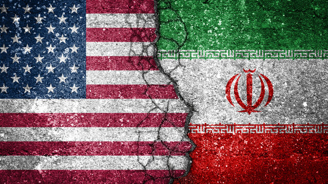 united states and iran flags painted on cracked concrete wall background