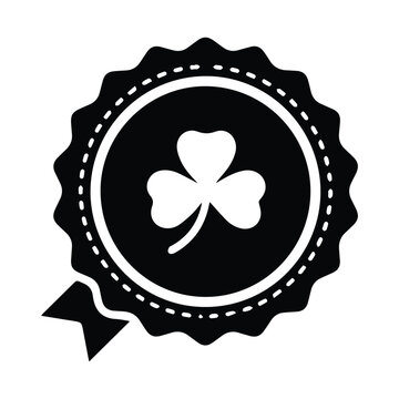 Black shamrock rosette award medal for st patrick's day on white background