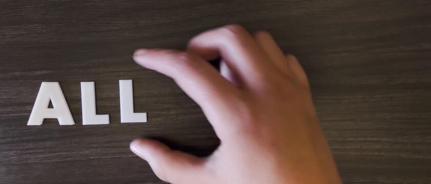 the word allergies written on a dark background with white block letters or capital letters (fast version)