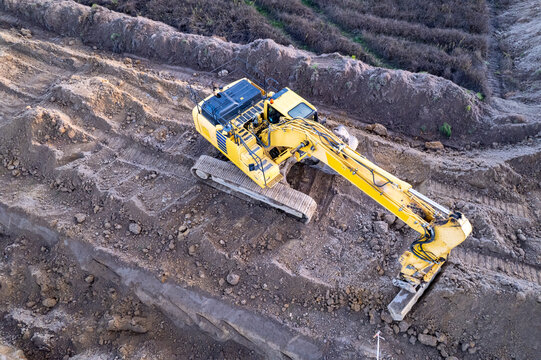 Top down drone shot of construction equipment The Concept of manual labor and machines