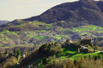 Naklejka premium Aerial view of Pizzino, the Alpine village in the municipality of Taleggio. Val Taleggio, Bergamasque Prealps, Lombardy, Italy