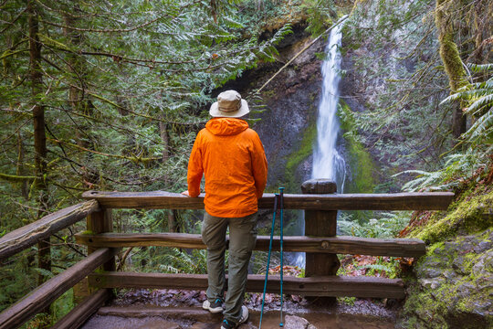 Hiker near waterfall