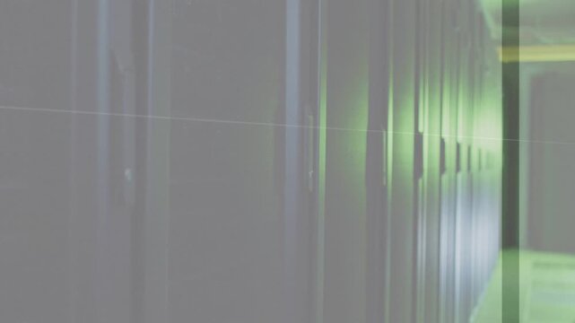 Camera moving along data corridor, cabinets glinting green while animated scans showing rack status