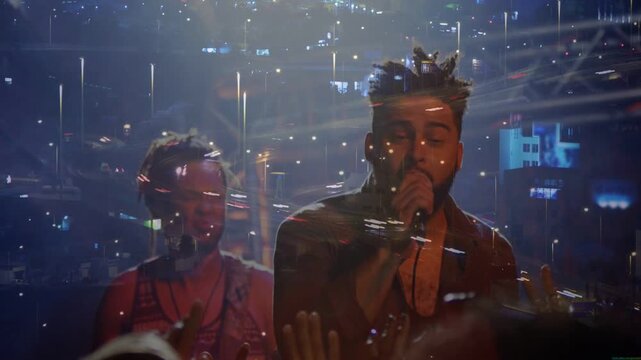 Lead singer raising mic, singing and engaging music crowd, backup, light streaks crossing faces