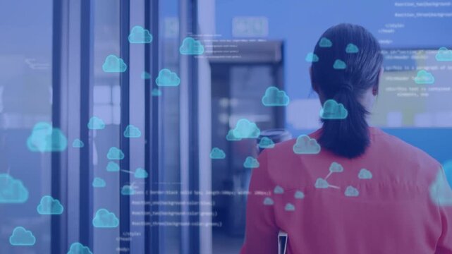Tech woman walking to glass office with coffee folder starting blue cloud code lines forming fading