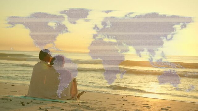 pair cuddling beach, watching sunset causing travel map overlay fading across horizon before them