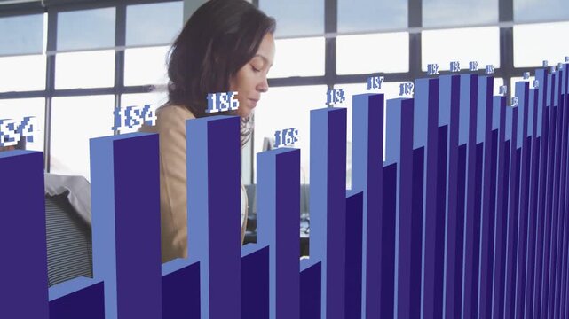 Diverse coworkers typing in open-plan office, woman in beige blazer using laptop, purple 3D chart