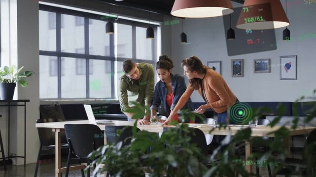 Vertical video: Man pointing at plans urging biz team sorting review on laptop, green data hovering