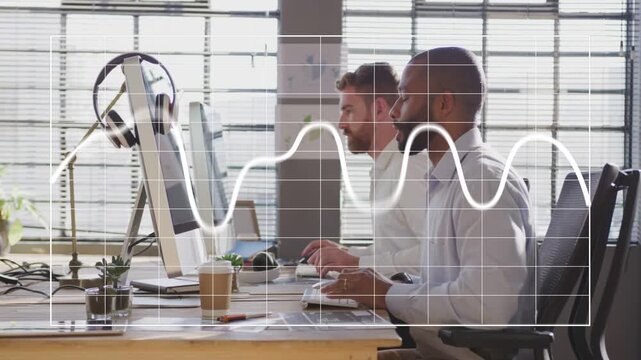 Two men typing at monitors, waveform starting top-right, sweeping grid while monitoring tech data