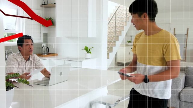 Dad sitting at laptop, son entering with cell handing bill, finance chart over island fluctuating