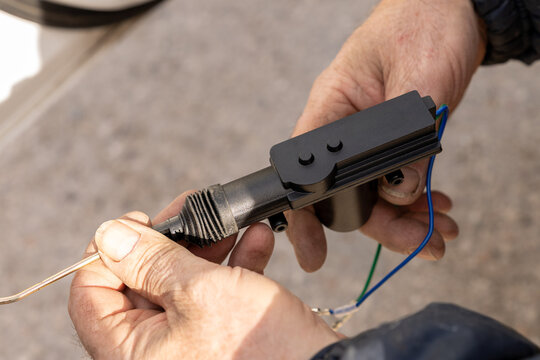 Replacing the central locking motor in a front door.