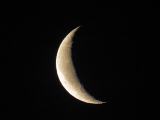waning crescent moon in sky © ralph