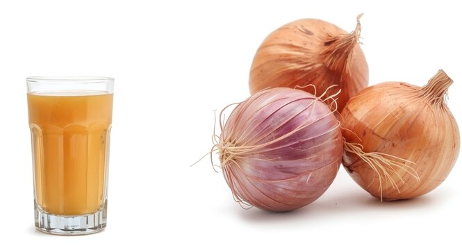 Organic Allium cepa juice in glass with raw onions isolated in detailed close up on white