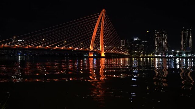 Saigon river and Ba Son Bridge at night in Ho Chi Minh, Vietnam	
