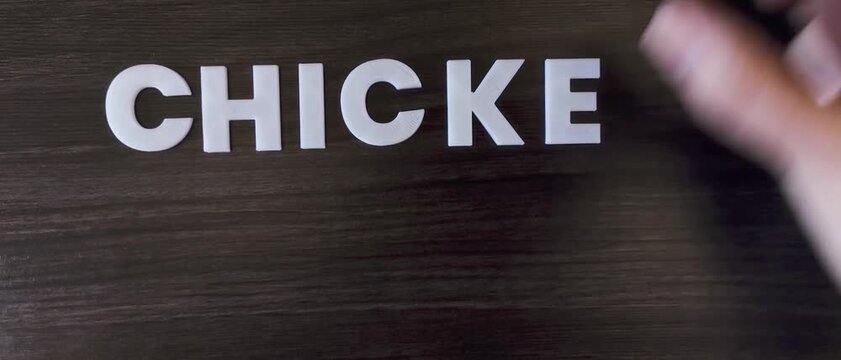 the word chicken pox written on a dark background with white block letters or capital letters (fast version)