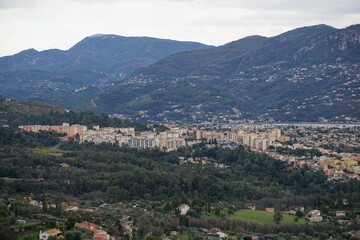 Fototapeta premium view from the top of the mountain of the town of carros, southern france