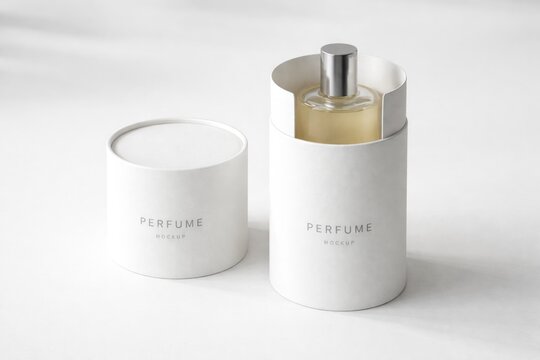 Minimalist perfume box mockup in cylindrical form with white paper cover