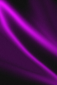 Abstract purple and black flowing fabric texture with soft blurred highlights