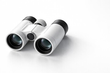 Fototapeta premium Close up of white binoculars on bright white surface with copy space area