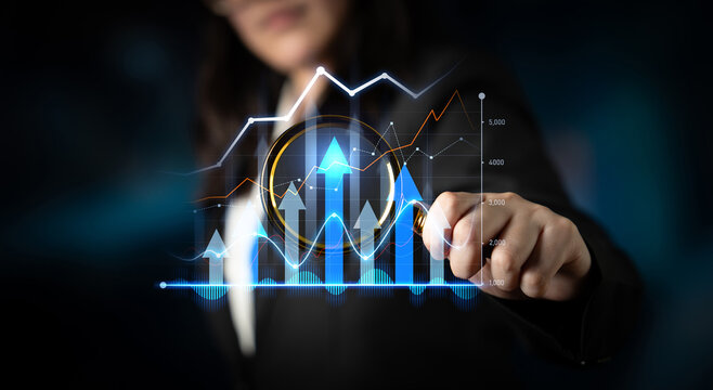 A business professional engages with a high-tech analytics interface, representing graphs and growth trends, showcasing the power of data in decision-making. Scalp