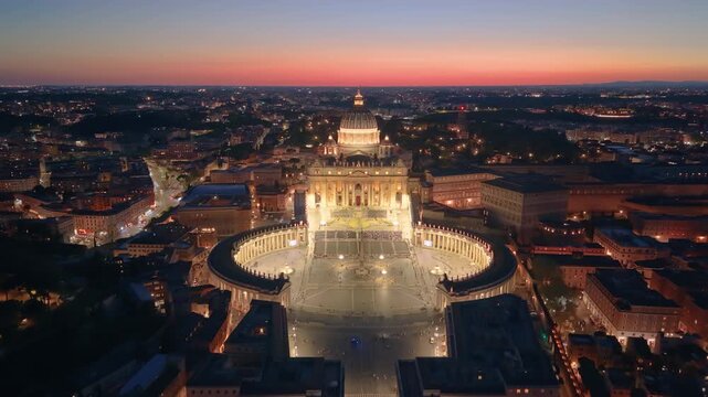 Aerial city view St. Peter's basilica in Rome, aerial shot at sunset with drone. San Pietro, Roma. 