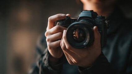 Fototapeta premium Photographer Holding DSLR Camera