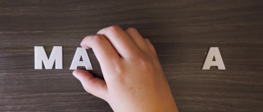 the word malaria written on a dark background with white block letters or capital letters (fast version)
